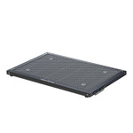 LaserPecker LX2 honeycomb cutting bed with four raised support pads and magnetic chain-style handles on both ends. 