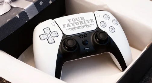 Engraved custom text on a game controller prepared for gifting.