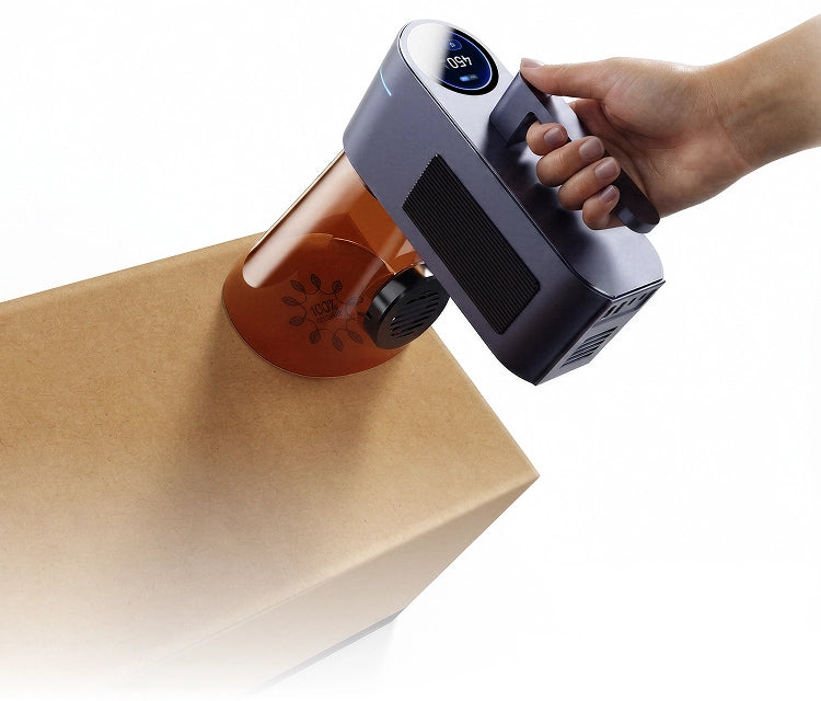 Handheld LaserPecker LP4 engraving on a large surface at a flexible angle.