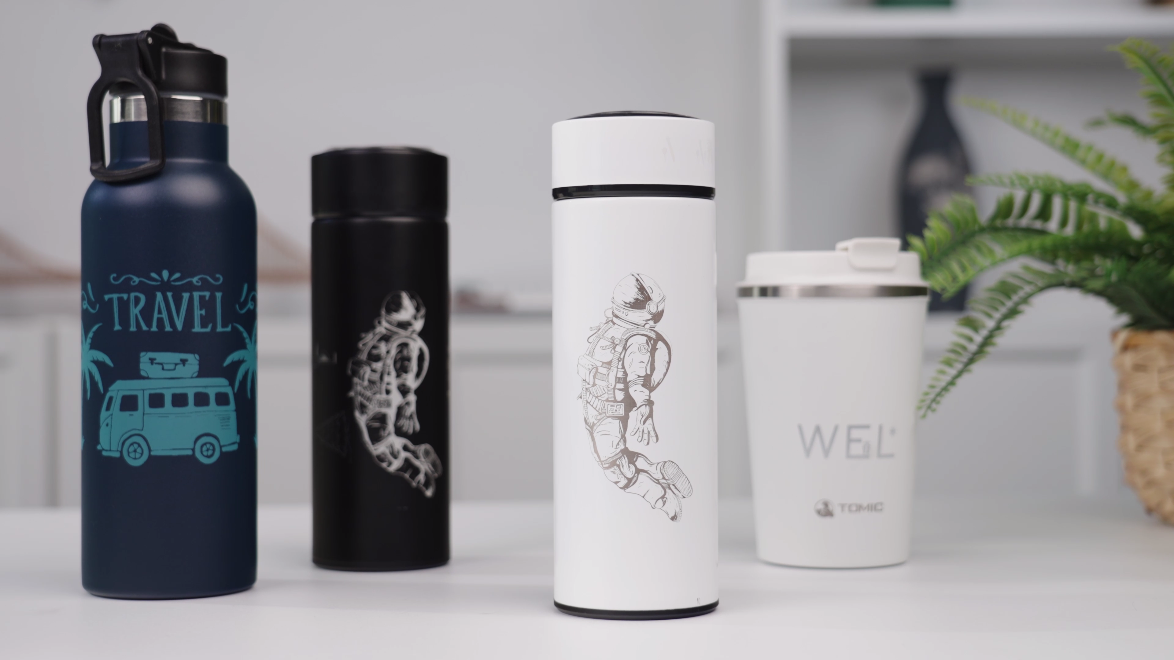4 Laser Engraved Bottles made with LP3